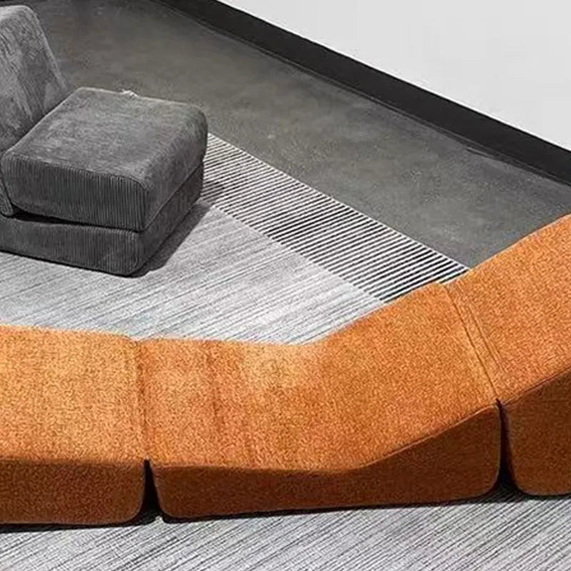 Fauteuil lounge orange terracotta – assise basse et dossier incliné