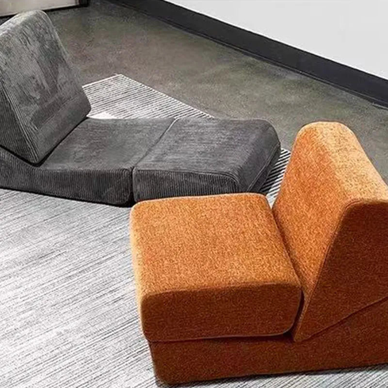 Fauteuil lounge orange terracotta – assise basse et dossier incliné