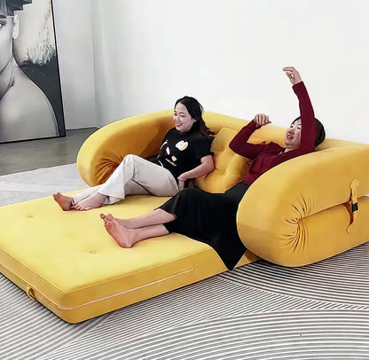 Banquette de sol crème à coussins traversins – espace détente enveloppant