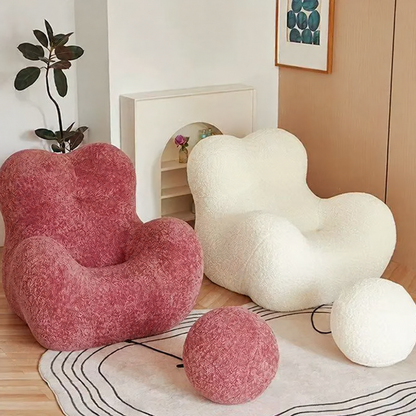 Fauteuil cocon en bouclette ivoire – silhouette nuage aux formes arrondies