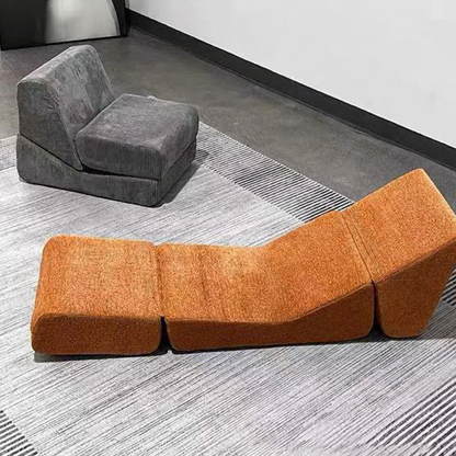 Fauteuil lounge orange terracotta – assise basse et dossier incliné