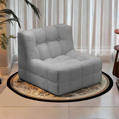 Fauteuil bas marron foncé capitonné – design contemporain sans accoudoirs