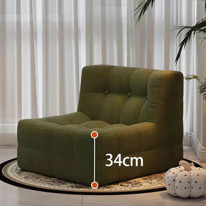 Fauteuil bas marron foncé capitonné – design contemporain sans accoudoirs