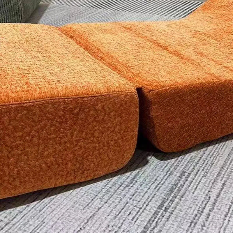 Fauteuil lounge orange terracotta – assise basse et dossier incliné