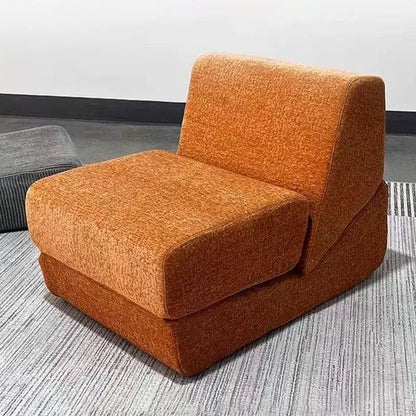 Fauteuil lounge orange terracotta – assise basse et dossier incliné